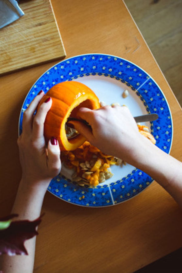 Scooping Out Seeds Carving the Perfect Pumpkin Heritage Custom Builders