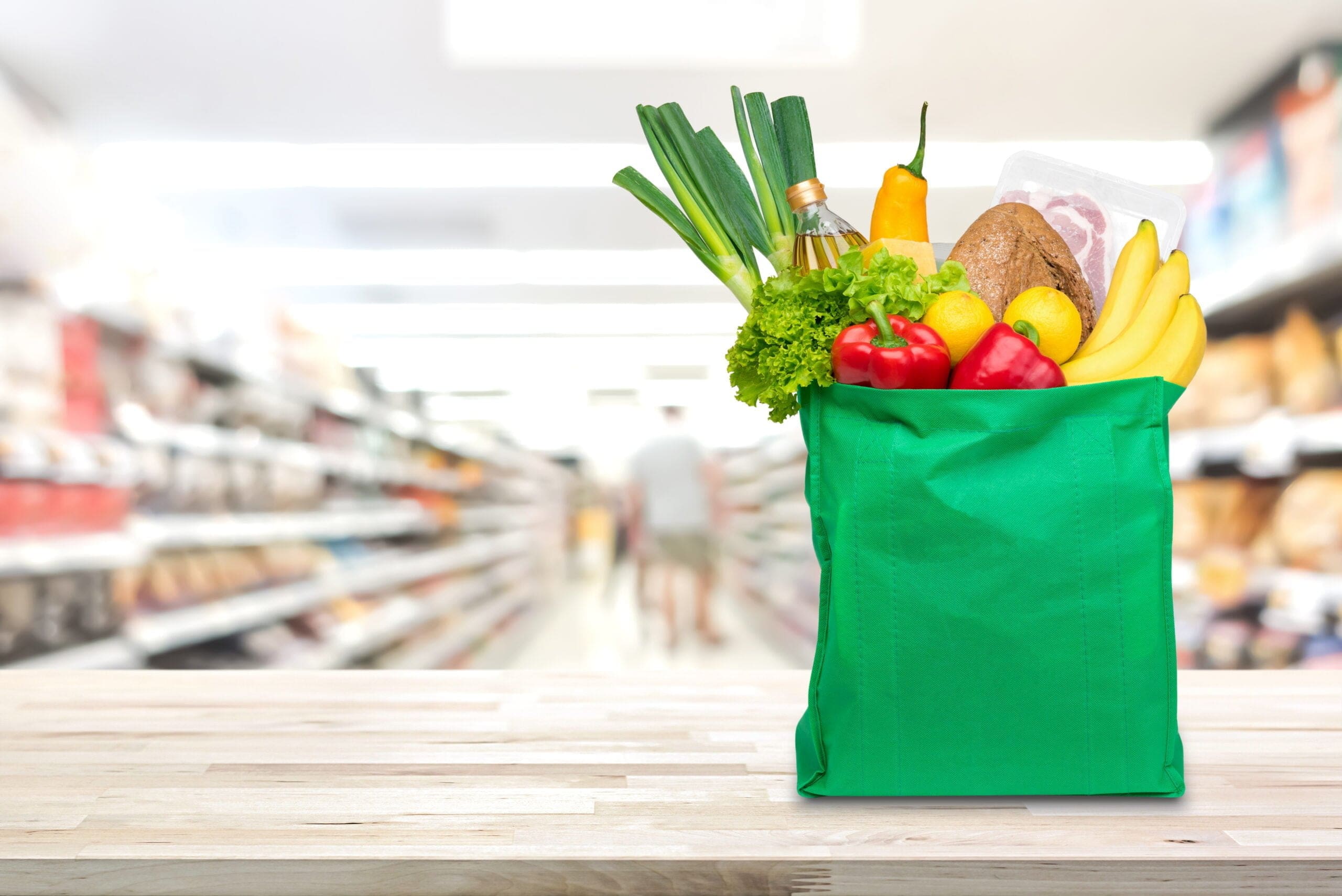 Reusable shopping bag filled with groceries