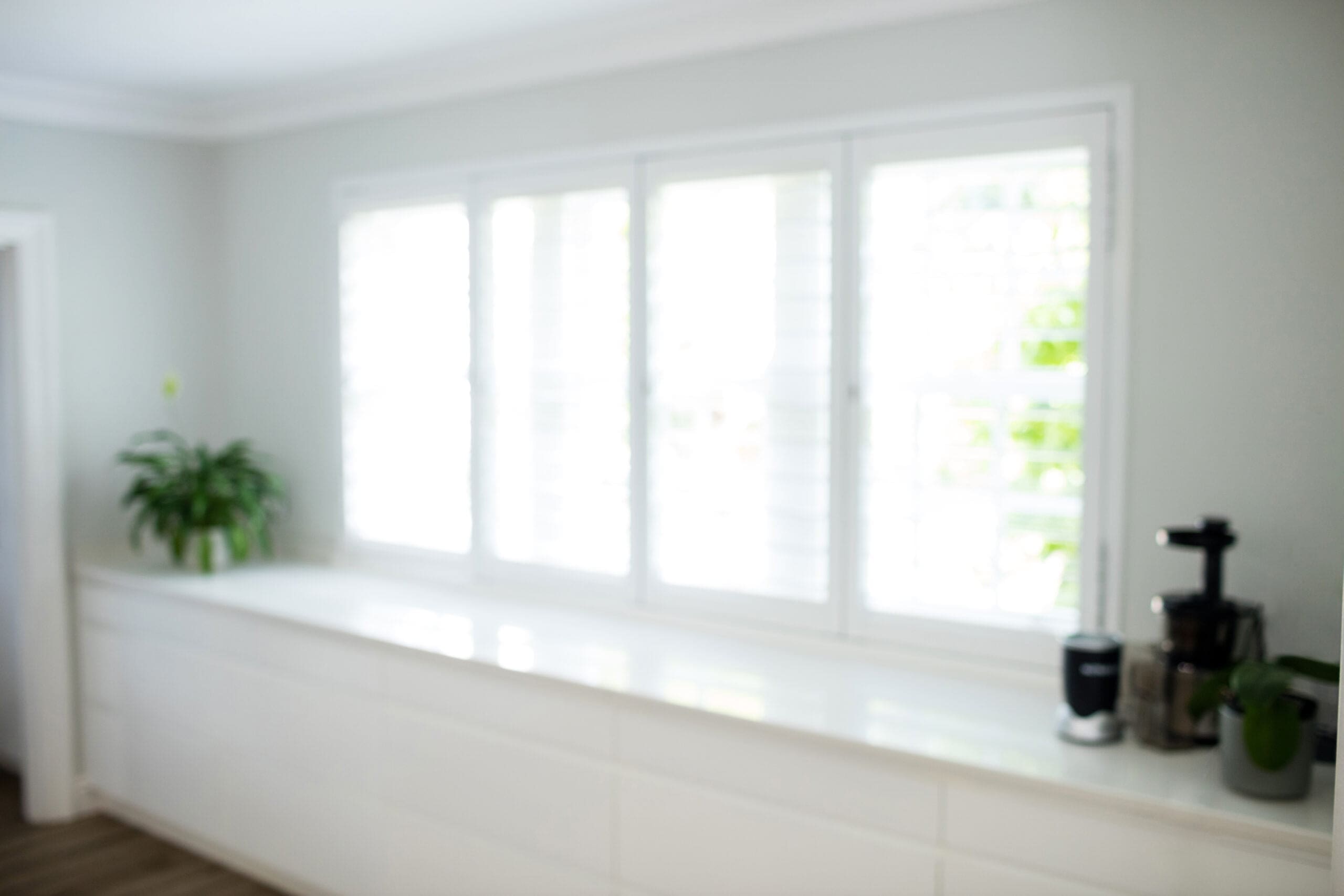 large kitchen window letting in natural light to home