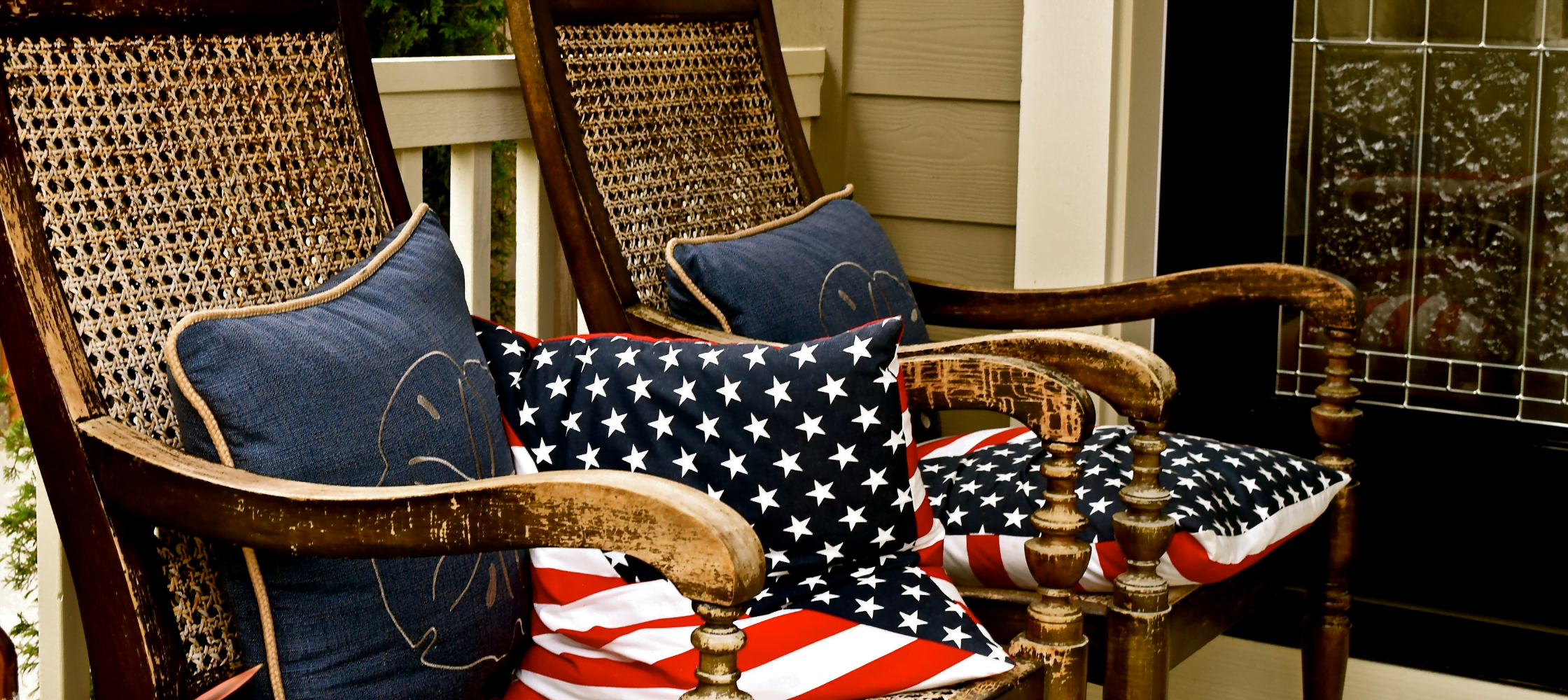 patriotic home decor pillows on patio chairs