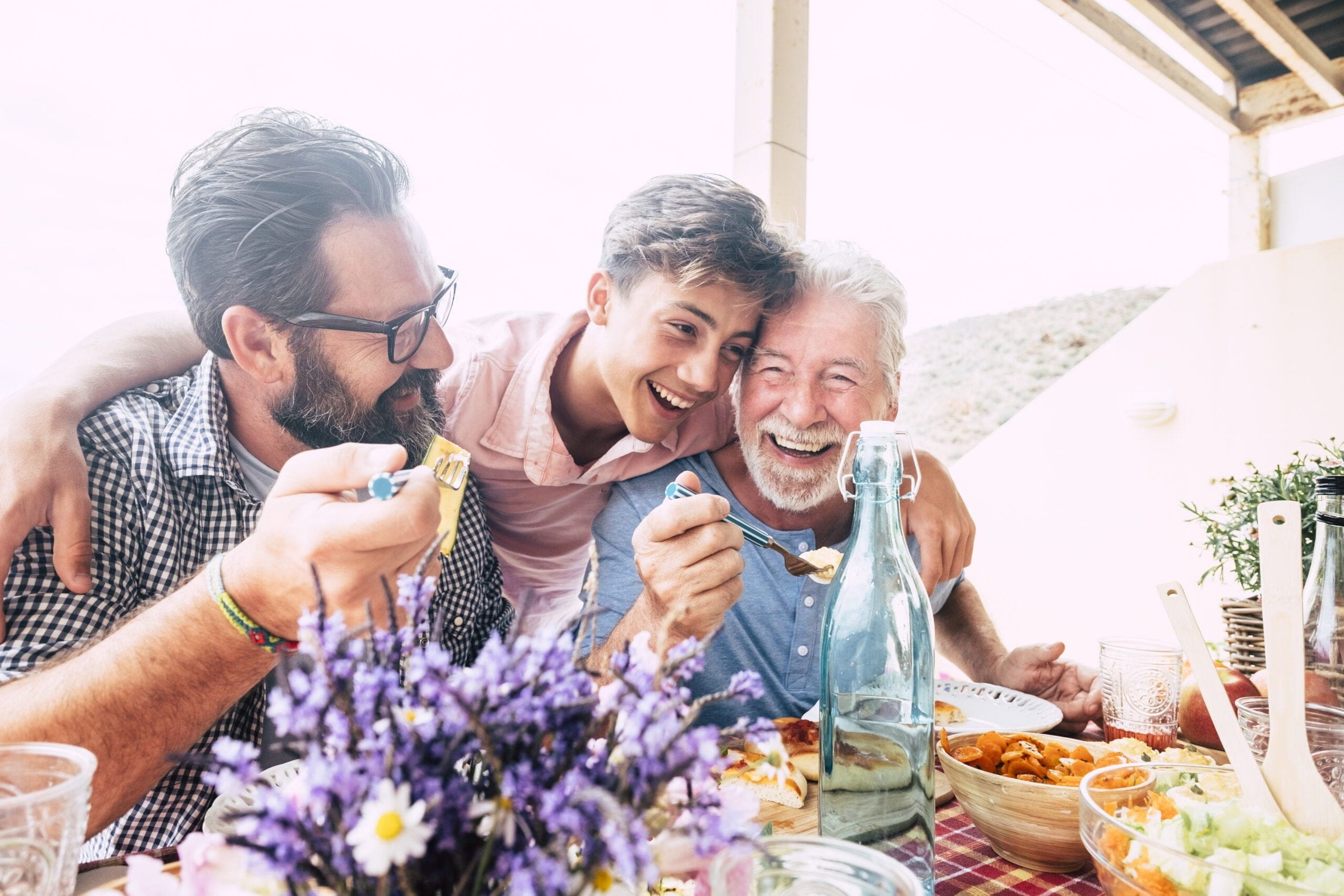 Three generations enjoying Father's day celebration bbq