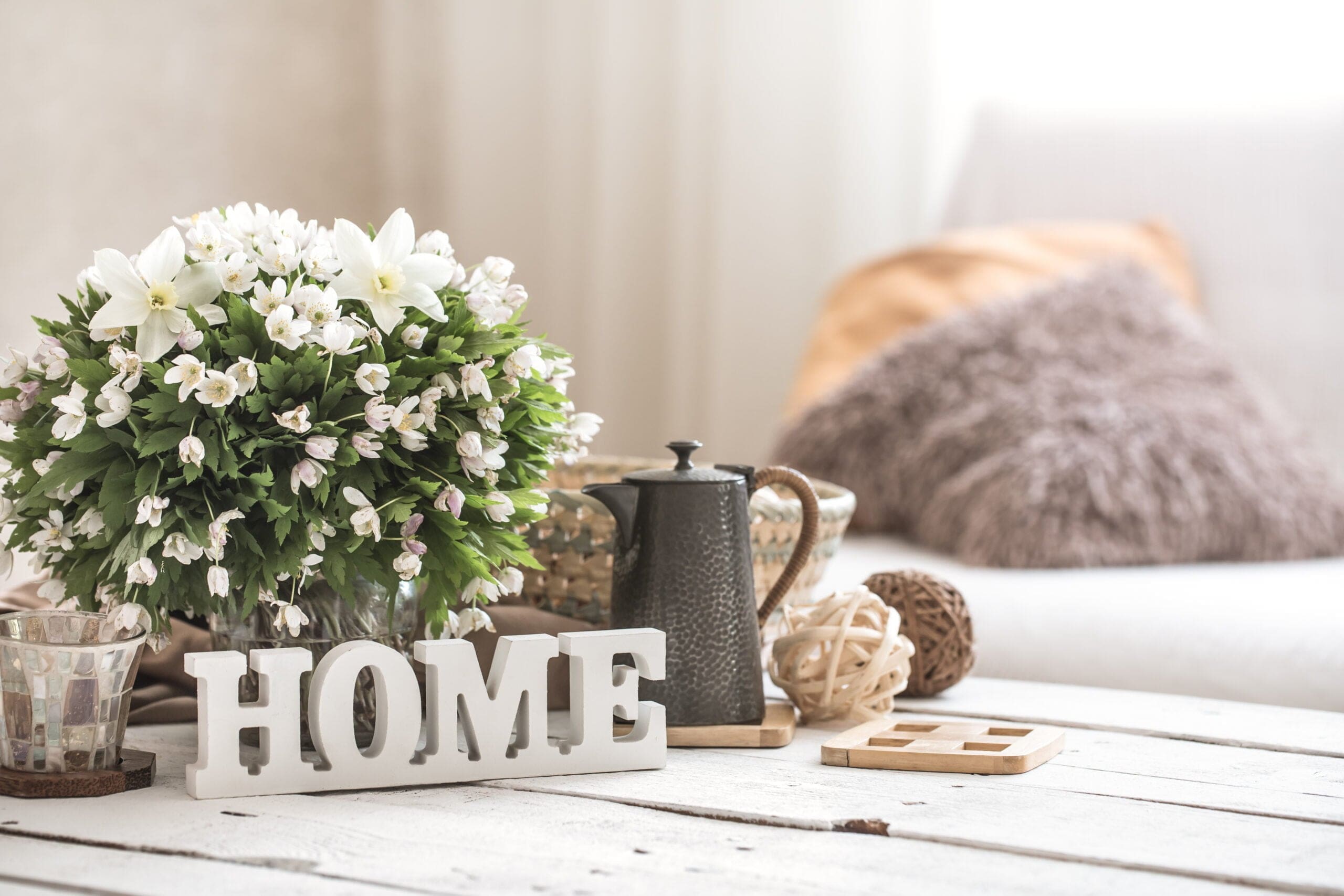 coffee table with accent decor to create modern farmhouse aesthetic