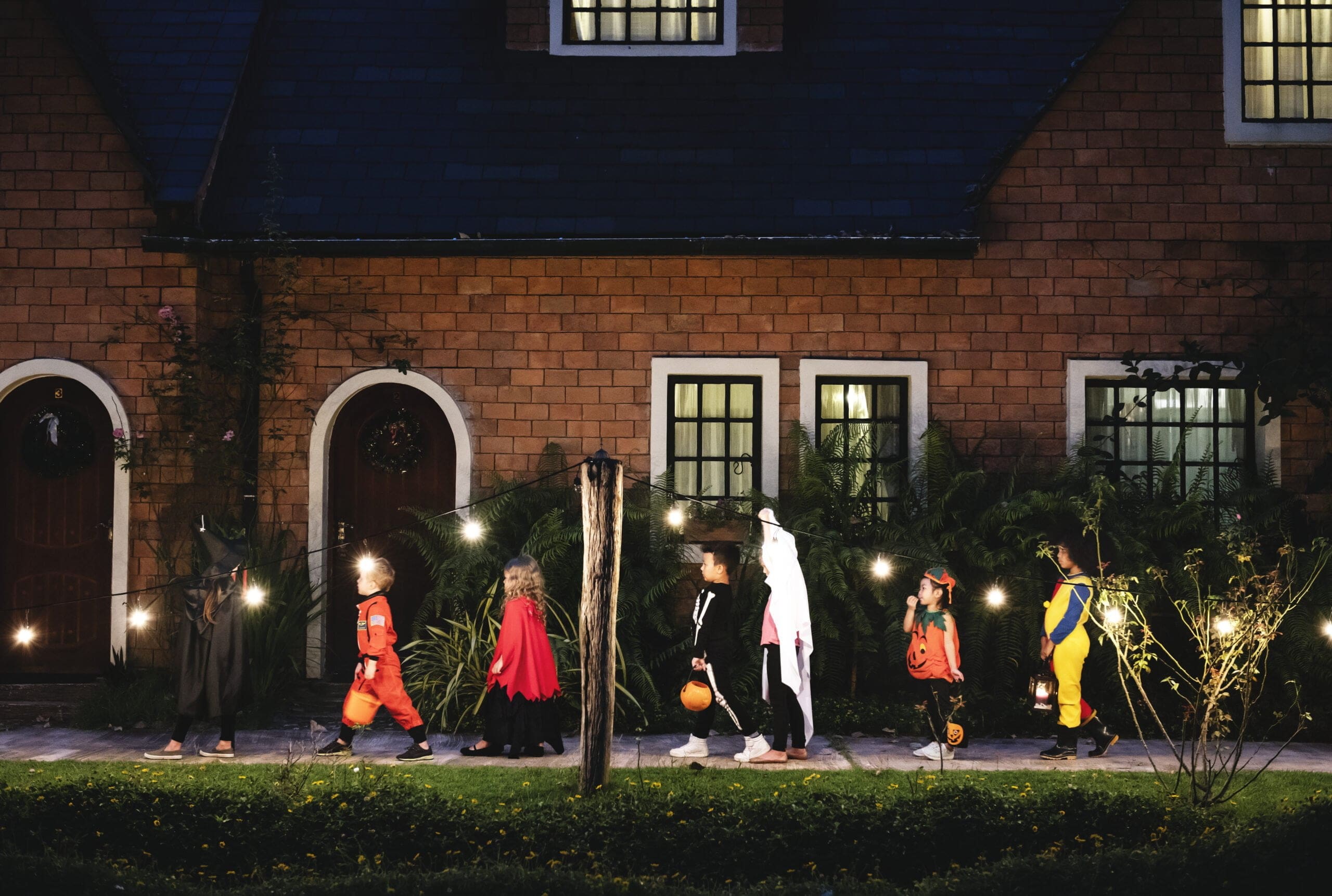group-kids-with-DIY-halloween-costumes-walking-trick-treating