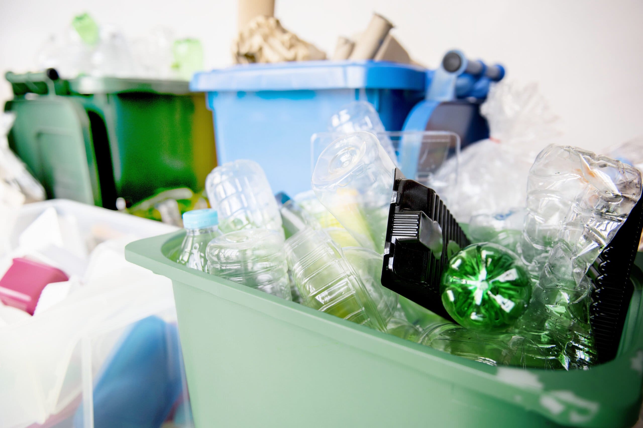 used-plastic-bottles-recycling-bins-america-recycles-day