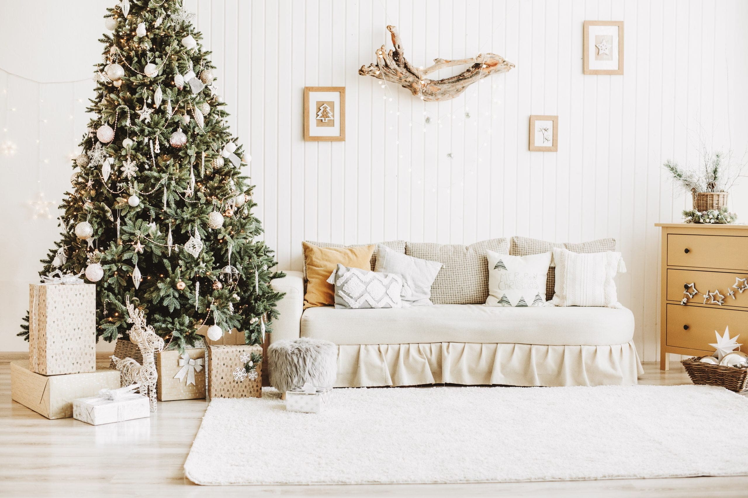 decorating your new home for the holidays with simple neutral rustic palette in living room