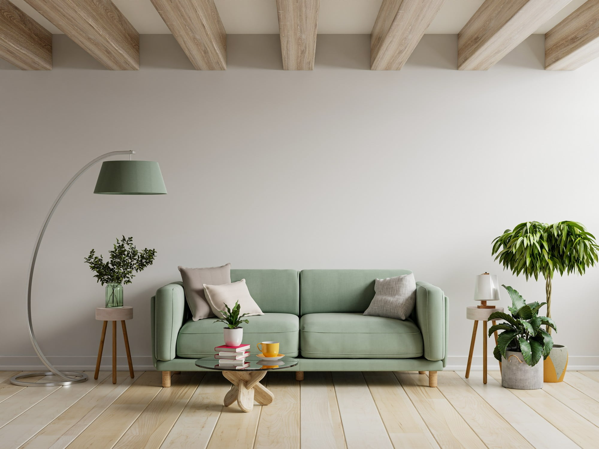 green sofa with summer home décor in living room