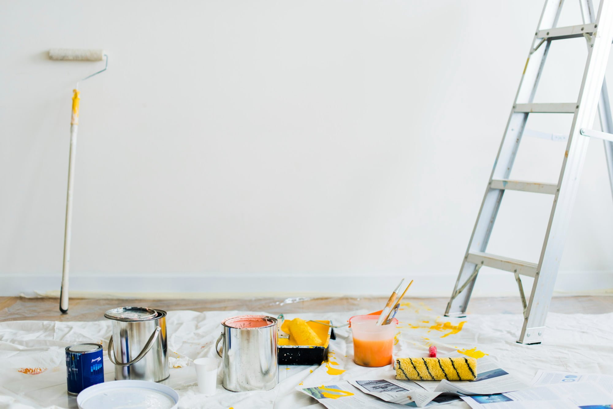 homeowner's painting set up following painting tips for your new home