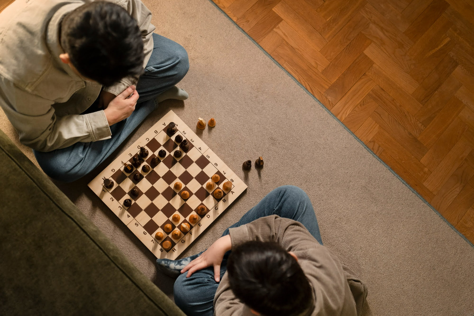 close-up-father-boy-playing-chess-as-one-of-the-winter-break-activities-for-kids